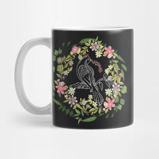 flower wreath with bird in the center Mug